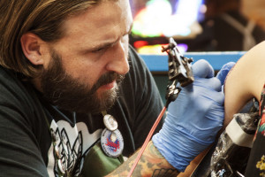 Nathan Haynes, Austin tattoo artist at True Blue Tattoo, appreciates tattooing for the cultural and aesthetic value, but also for the artistic process, which allows him to focus his attention on his work.