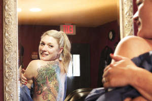 Austin resident Lauren McIntyre used to daydream of being a marine biologist or some how working with the ocean. Now, she’s having an old mermaid and sea horse tattoo on her back doctored by Zulu at Zulu tattoo in Austin. “I love the sea, the ocean, everything about water,” She says. “It’s just what makes me happy.”